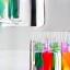 Vials with colored liquids, symbolizing custom formulation